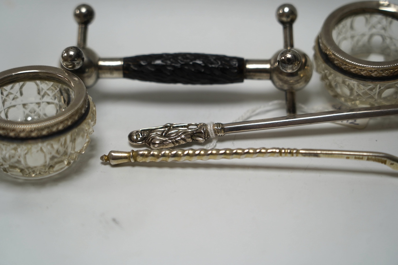 A late 19th century Russian engraved 84 zolotnik spoon, dated 1890, 16.8cm, a George V silver apostle spoon, together with three other items including silver mounted glass salts. Condition - poor to fair to good